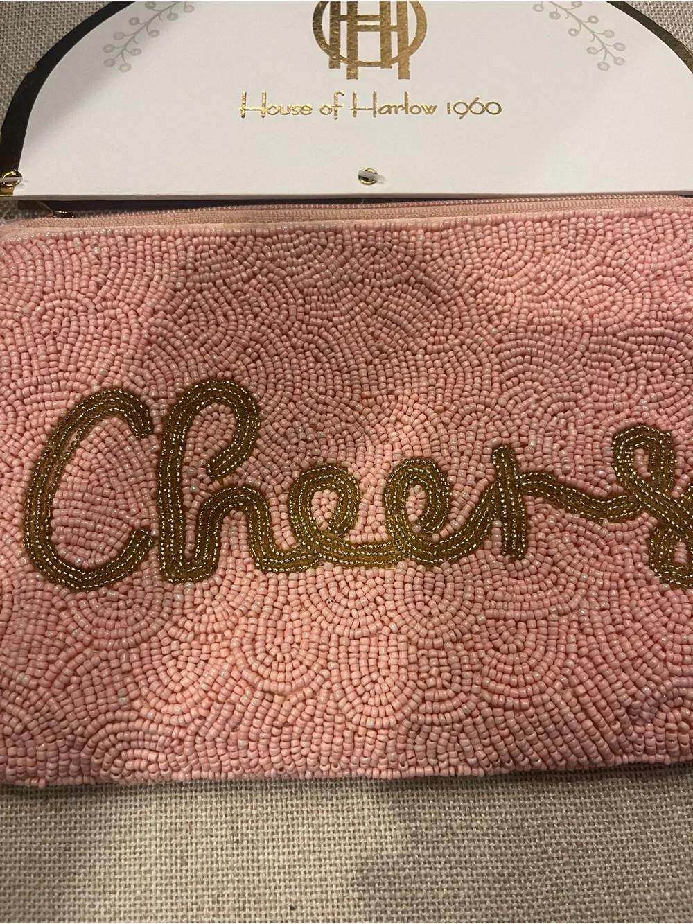 NWT House of Harlow 1960 Pink Beaded 'Cheers!' Wristlet Clutch with Gold Script